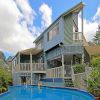 Watch the storms roll in from this Unique Designer split level home!! thumb